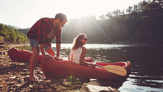 Couple going on a kayak